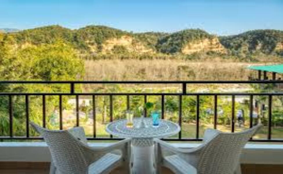 River view resort in Jim Corbett , picture of river view through room